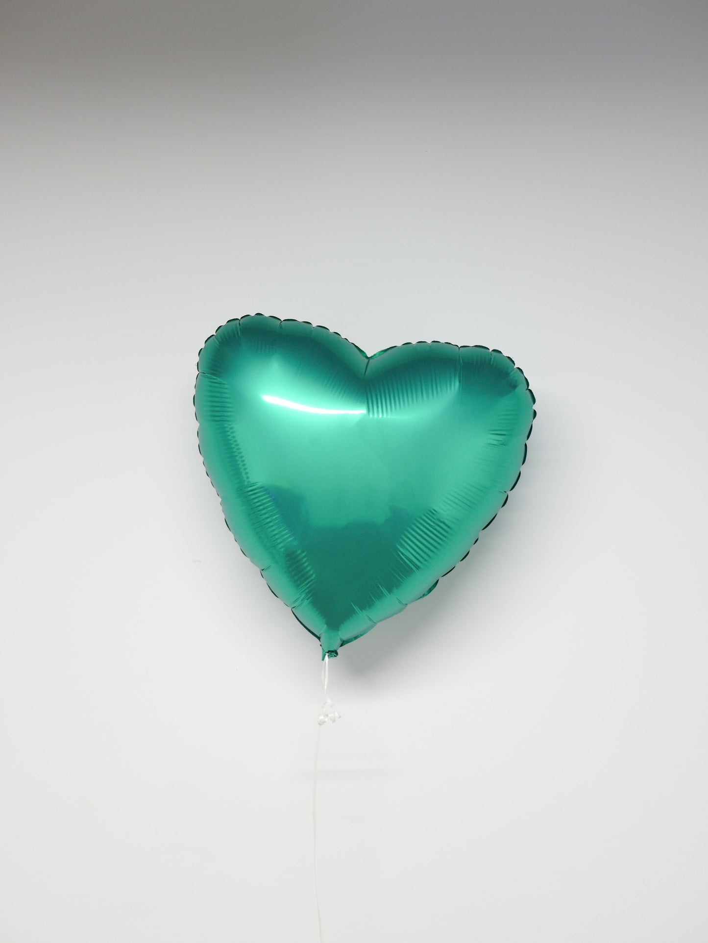 Фольгована кулька серце зеленого кольору