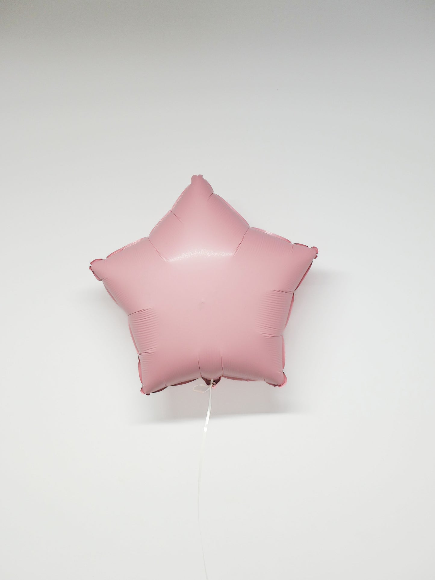 Фольгована кулька зірка рожевого кольору